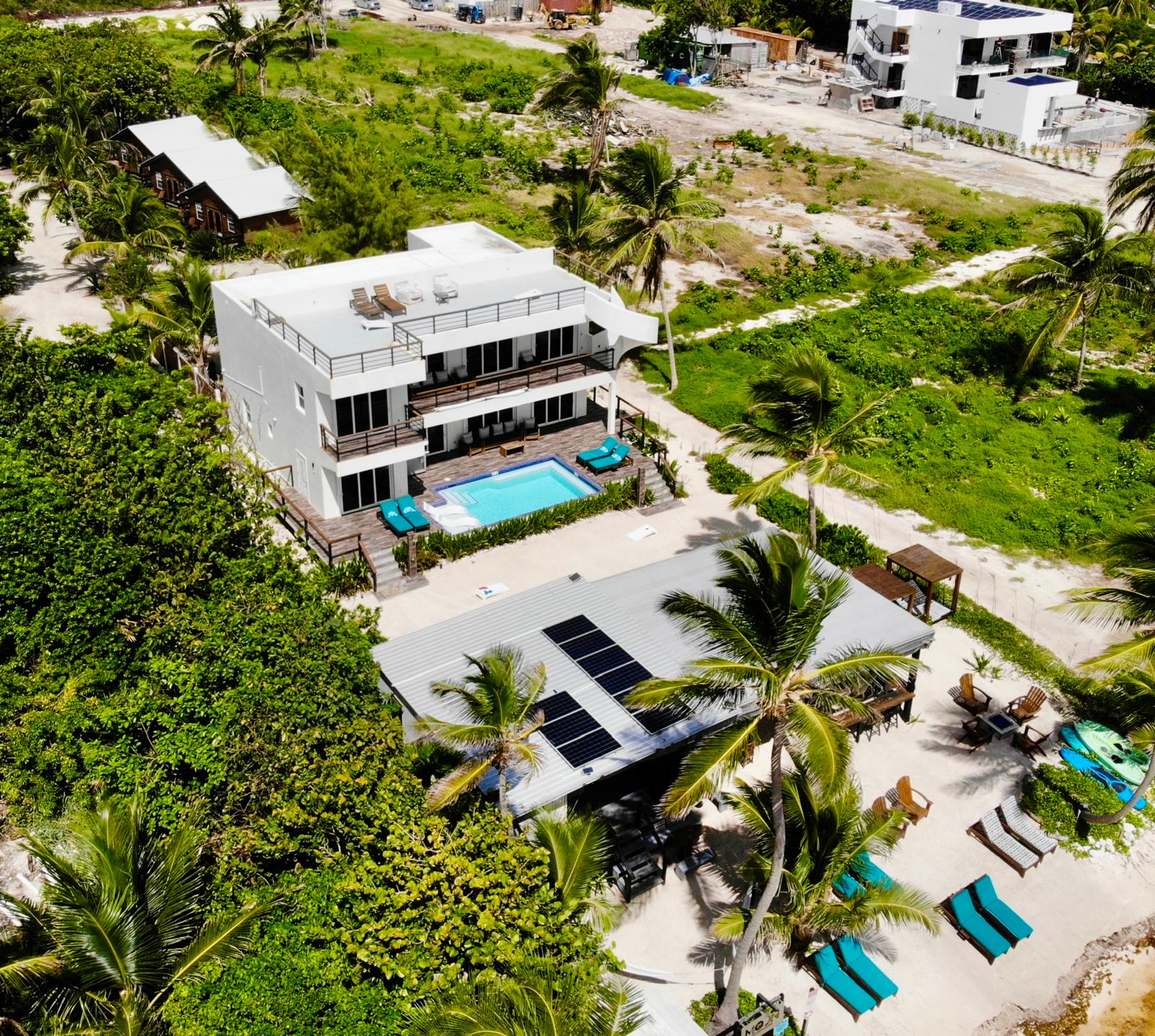 Aerial view of the front of the hotel, Moon Bar, and beach