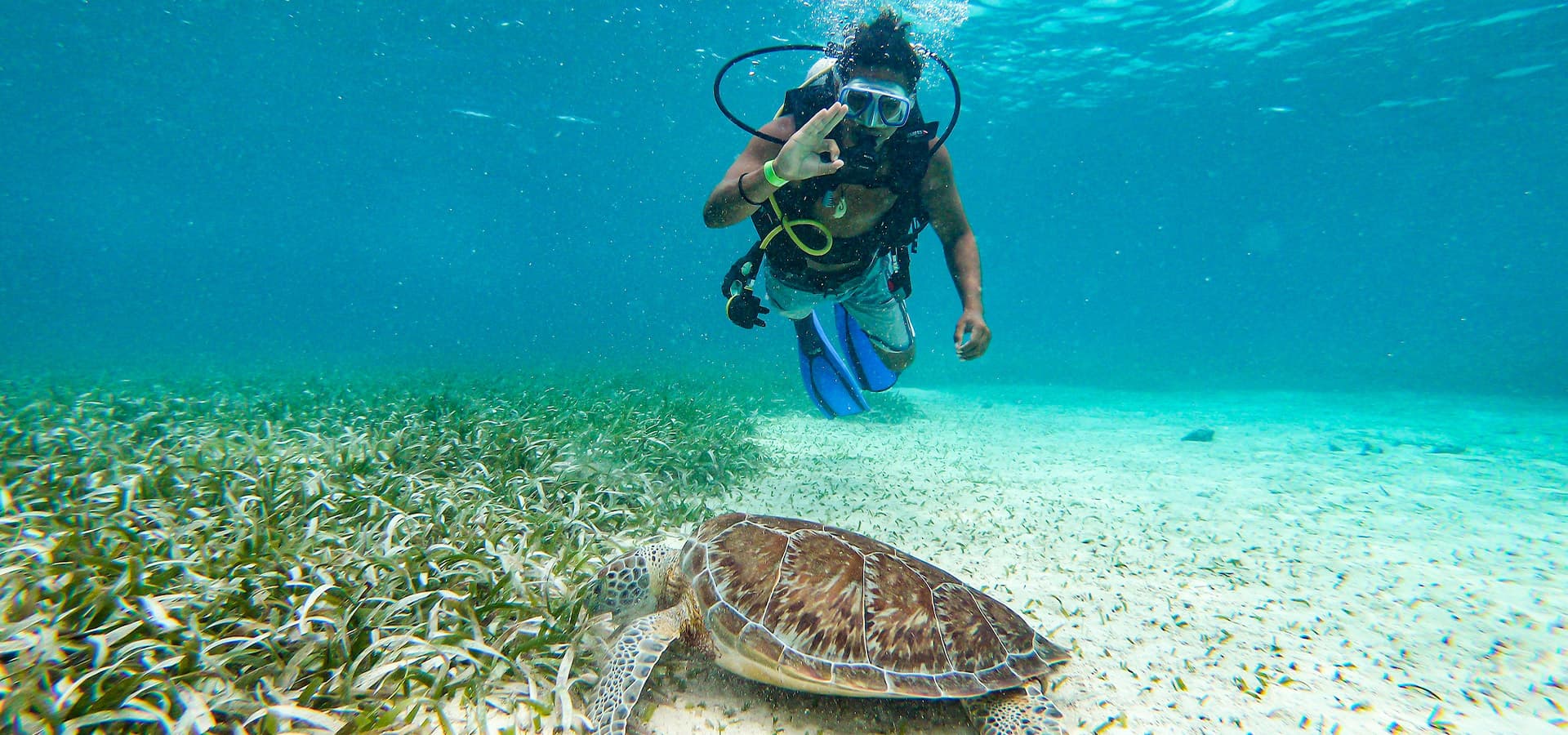 man snorkeling in belize